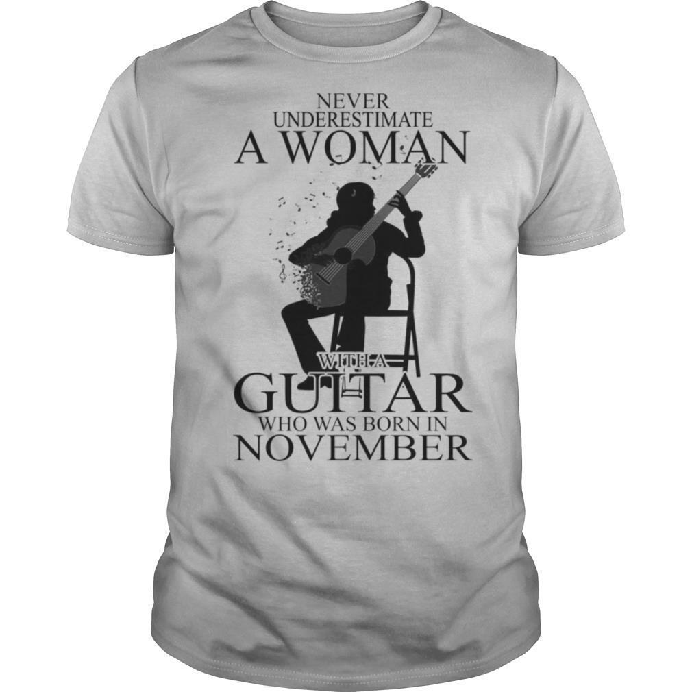 Never underestimate a woman with a hiking who was born in december shirt