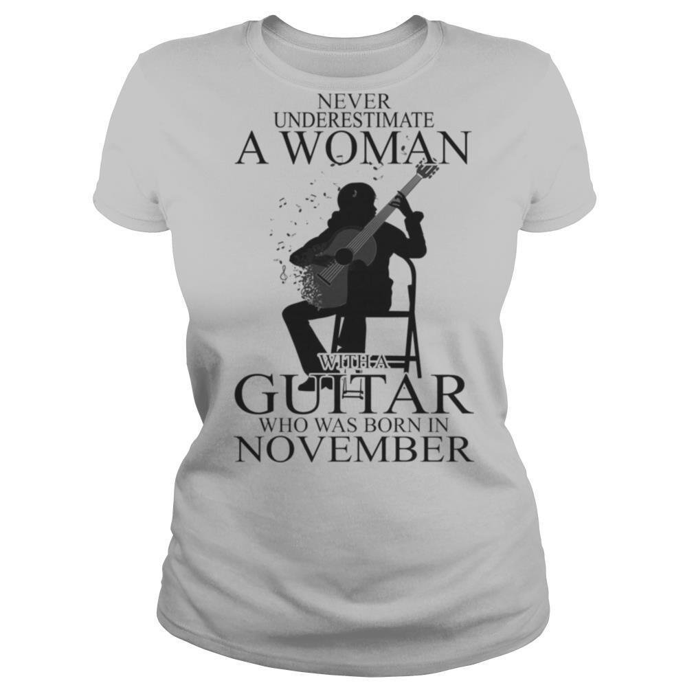 Never underestimate a woman with a hiking who was born in december shirt